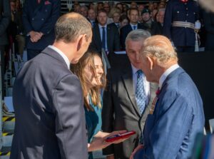 The King presents Miss Alice Steen the 2024 medal